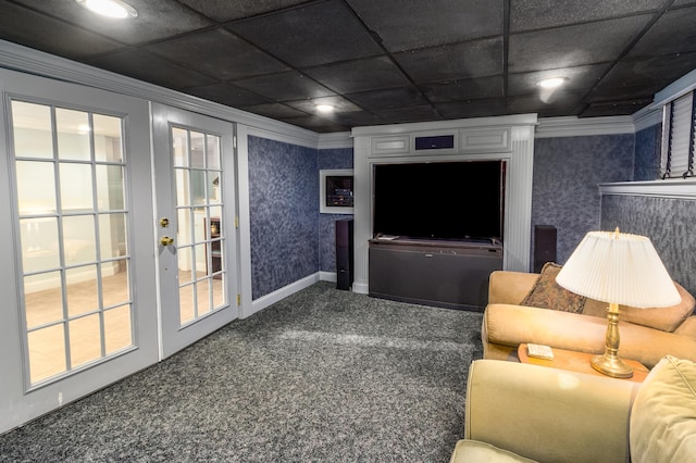 home theater with a drop ceiling, crown molding, and french doors