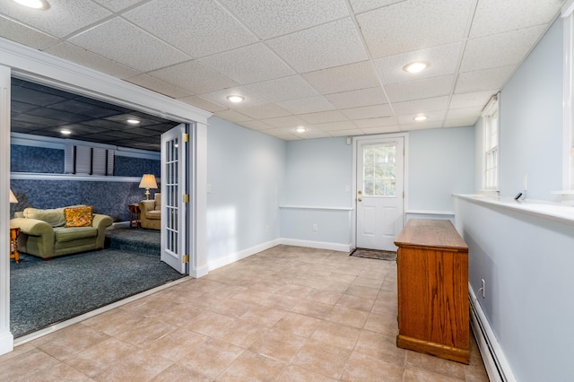 doorway to outside with a baseboard radiator