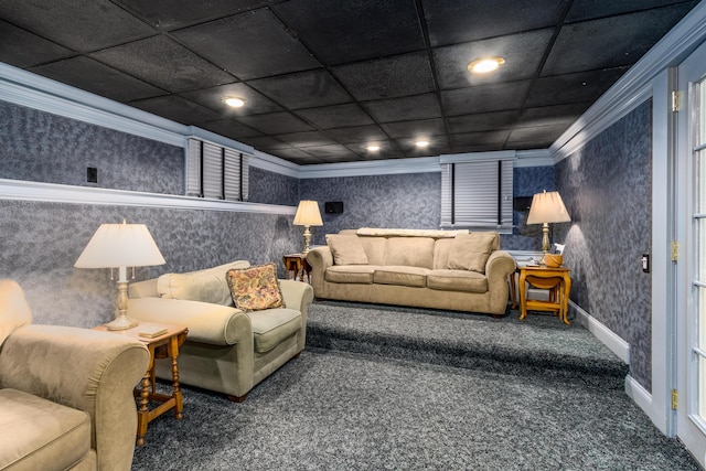 carpeted cinema room featuring crown molding