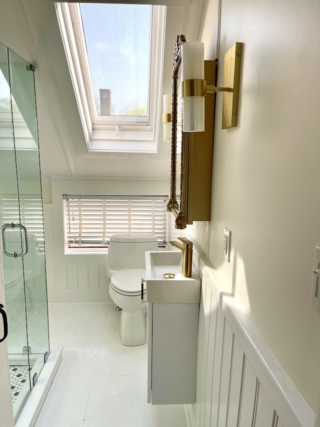 54 Commercial St Unit 3, 4, 5, 6, Provincetown, MA 02657 - full bathroom featuring vanity, a skylight, toilet, and a shower stall