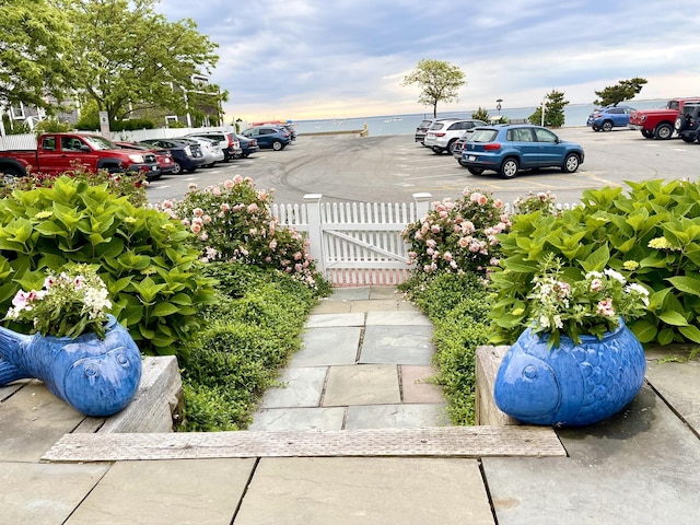 54 Commercial St Unit 3, 4, 5, 6, Provincetown, MA 02657 - view of yard with a water view and fence