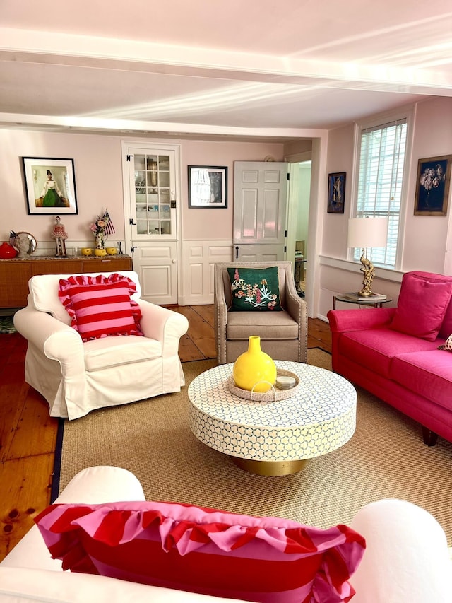 54 Commercial St Unit 3, 4, 5, 6, Provincetown, MA 02657 - living area featuring beamed ceiling and wood finished floors