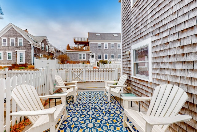49 Bradford St Unit 9, Provincetown, MA 02657 - wooden deck featuring a residential view