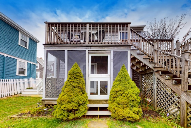 49 Bradford St Unit 9, Provincetown, MA 02657 - back of house with stairs and a sunroom