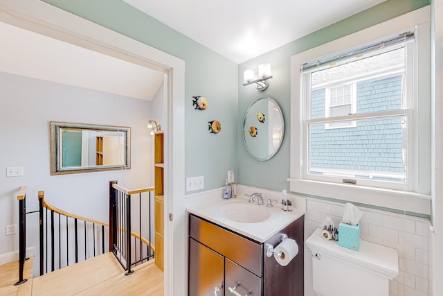 49 Bradford St Unit 9, Provincetown, MA 02657 - bathroom with vanity, toilet, and wood finished floors