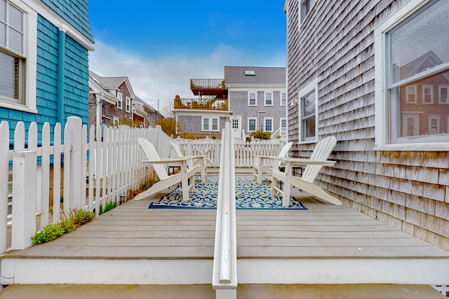 49 Bradford St Unit 9, Provincetown, MA 02657 - wooden deck featuring a residential view