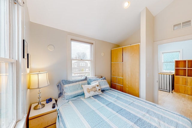 49 Bradford St Unit 9, Provincetown, MA 02657 - bedroom featuring multiple windows and lofted ceiling