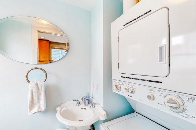 49 Bradford St Unit 9, Provincetown, MA 02657 - laundry room with stacked washer / dryer