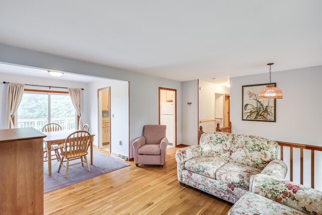 living room with hardwood / wood-style floors