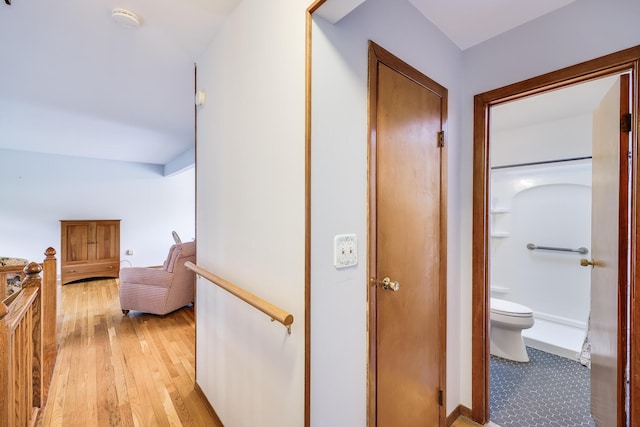 corridor featuring light hardwood / wood-style flooring