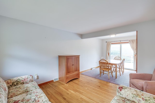 living room with hardwood / wood-style flooring