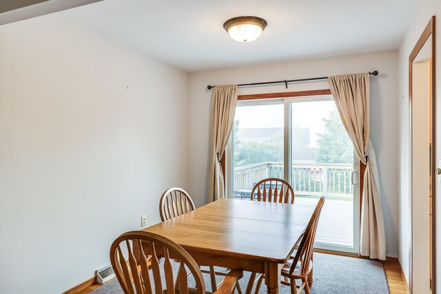 dining room with light wood-type flooring