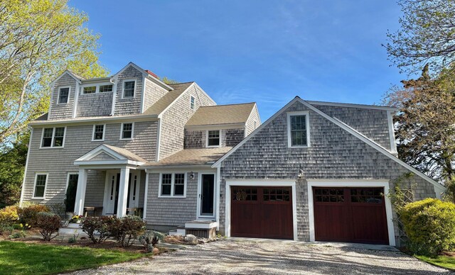 2 Seaview Rd, Orleans, MA 02653 - shingle-style home featuring aphalt driveway, an attached garage, and a shingled roof