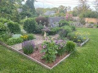 2 Seaview Rd, Orleans, MA 02653 - view of yard featuring fence and a garden