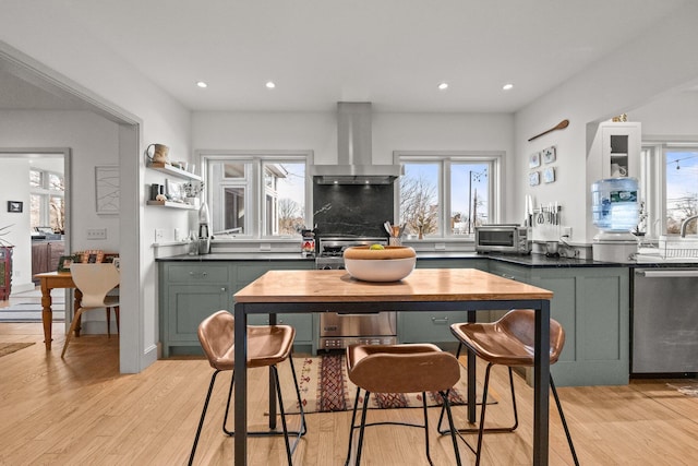 2 Seaview Rd, Orleans, MA 02653 - kitchen featuring green cabinetry, wall chimney range hood, a wealth of natural light, and dishwasher