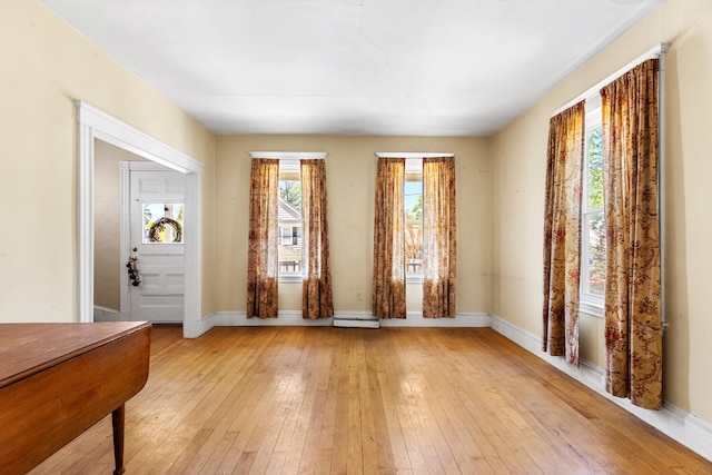 32 Grogan Ave, Quincy, MA 02169 - foyer featuring light wood finished floors, baseboard heating, and baseboards