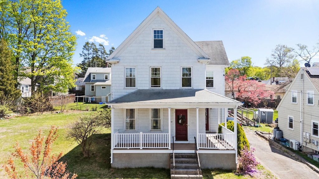 32 Grogan Ave, Quincy, MA 02169 - view of front of home featuring a porch and a shingled roof