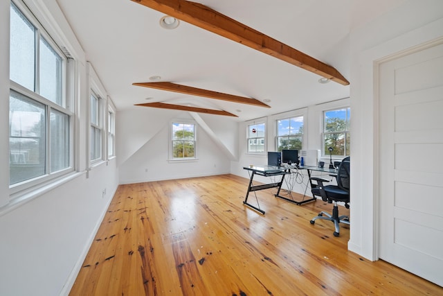 office area featuring vaulted ceiling with beams and light hardwood / wood-style flooring