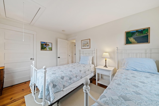 bedroom with light hardwood / wood-style flooring