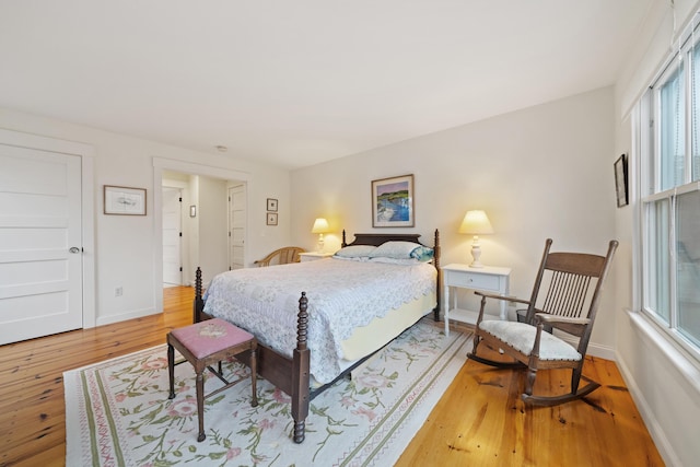 bedroom with light hardwood / wood-style flooring