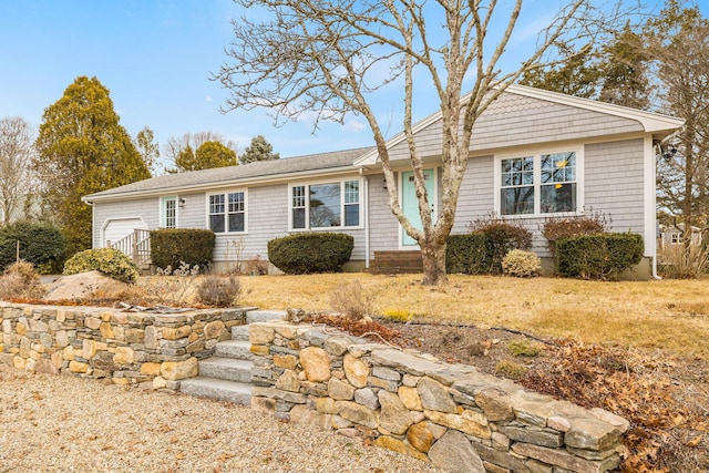 single story home featuring a garage