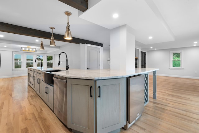 38 Mill St, Dennis Port, MA 02639 - kitchen featuring dishwasher, baseboards, a sink, and gray cabinets