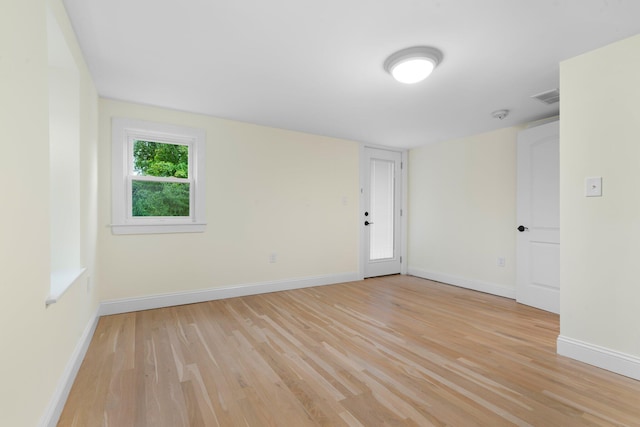 38 Mill St, Dennis Port, MA 02639 - spare room featuring visible vents, light wood finished floors, and baseboards