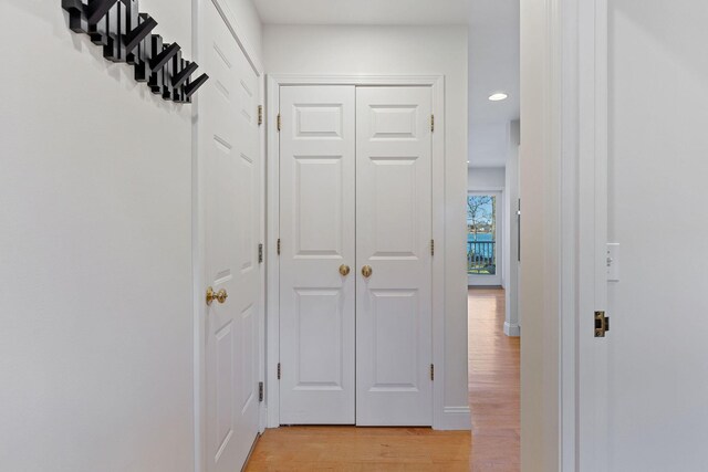 entryway with light hardwood / wood-style flooring