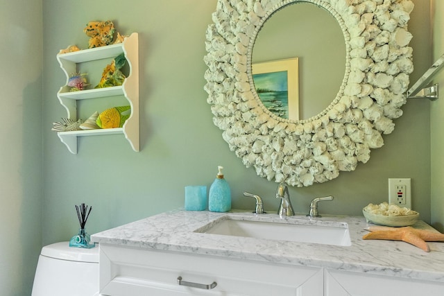 interior details with vanity and toilet