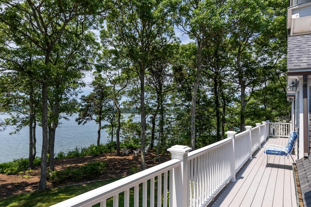 wooden deck featuring a water view