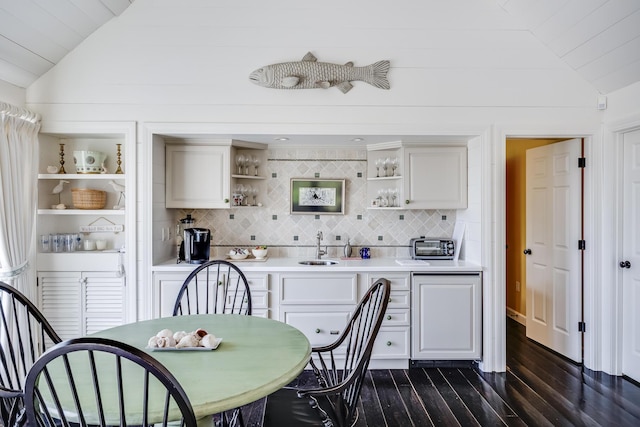 391 Sea View Ave, Osterville, MA 02655 - dining area with vaulted ceiling and dark wood-type flooring