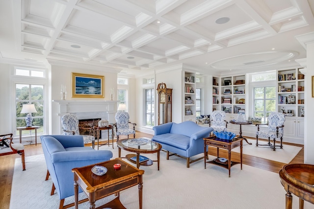 391 Sea View Ave, Osterville, MA 02655 - living area featuring wood finished floors, a premium fireplace, coffered ceiling, healthy amount of natural light, and beam ceiling