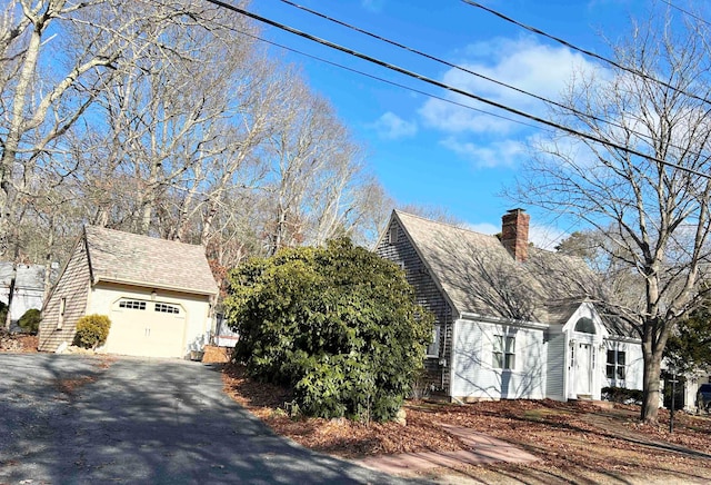 view of property exterior with a garage