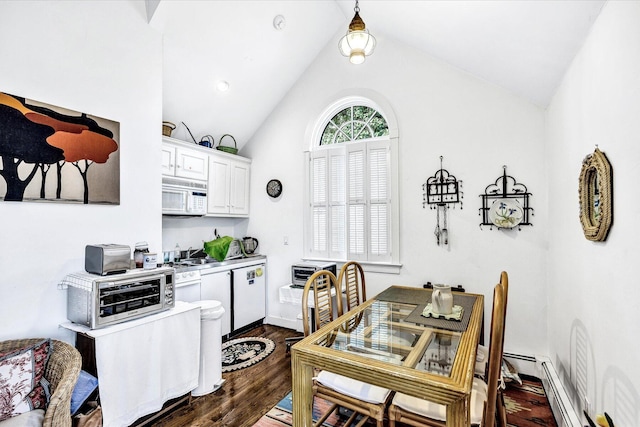 kitchen with white microwave, dishwashing machine, dark wood finished floors, white cabinets, and lofted ceiling