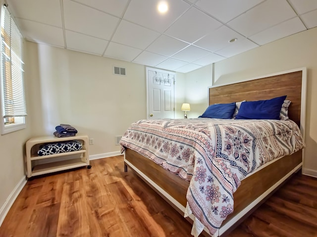 30 Norris Path, Teaticket, MA 02536 - bedroom featuring wood finished floors, a paneled ceiling, and baseboards