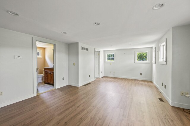 empty room with light wood-type flooring