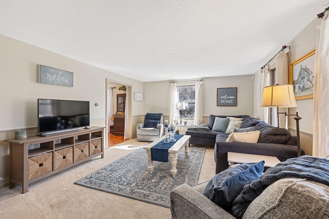 living area featuring carpet flooring