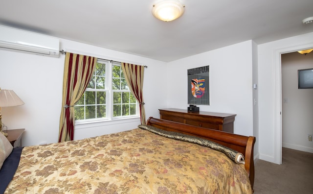 2181 Service Rd, West Barnstable, MA 02668 - bedroom featuring a wall unit AC, carpet floors, and baseboards