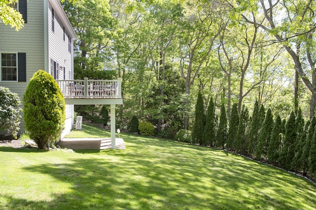 2181 Service Rd, West Barnstable, MA 02668 - view of grassy yard with a wooden deck