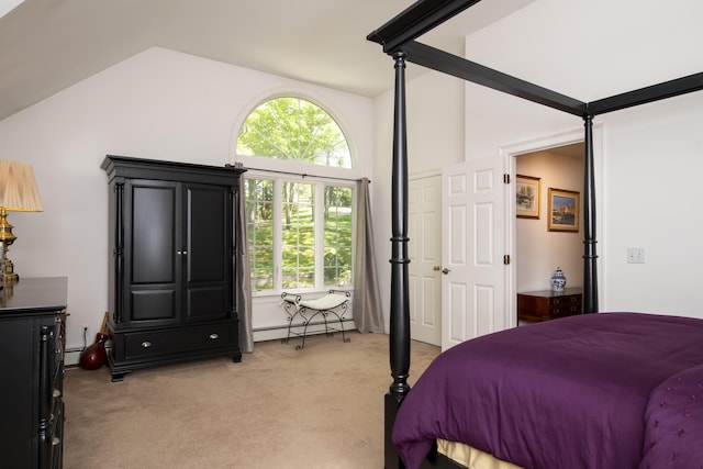 2181 Service Rd, West Barnstable, MA 02668 - bedroom with vaulted ceiling, light colored carpet, and a baseboard heating unit