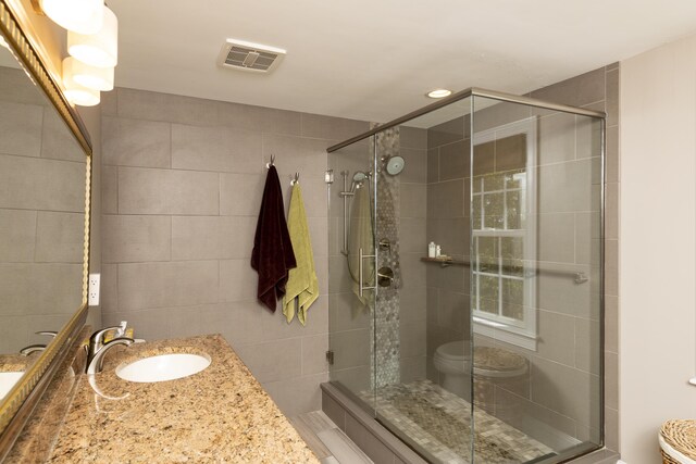 2181 Service Rd, West Barnstable, MA 02668 - bathroom with vanity, toilet, and a shower stall
