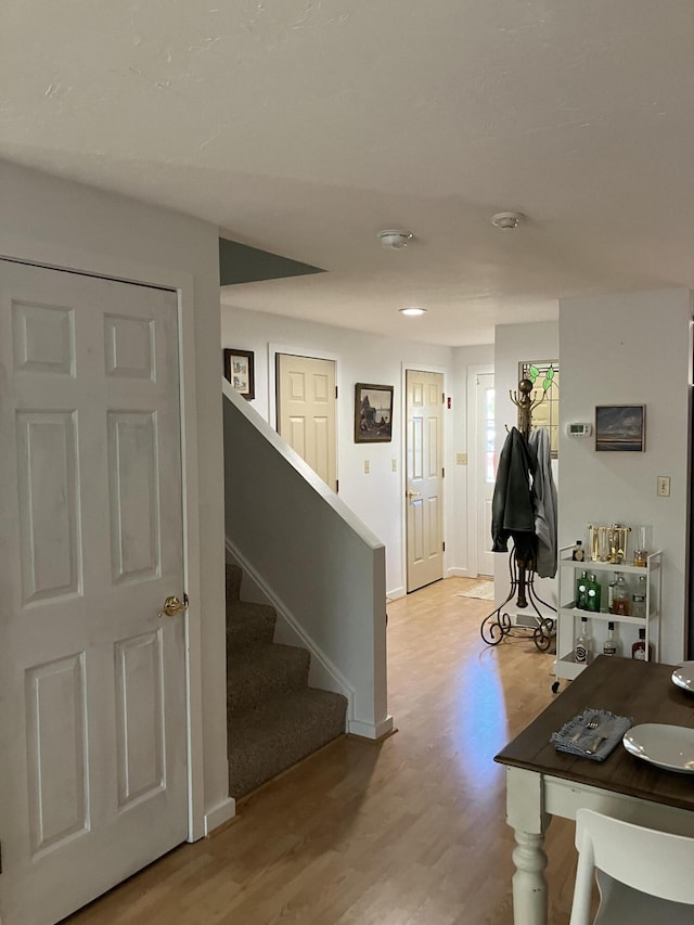 entrance foyer with light hardwood / wood-style flooring