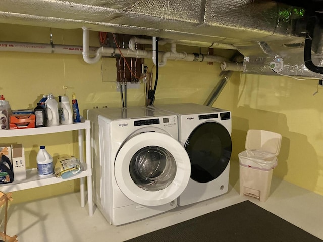 clothes washing area with independent washer and dryer