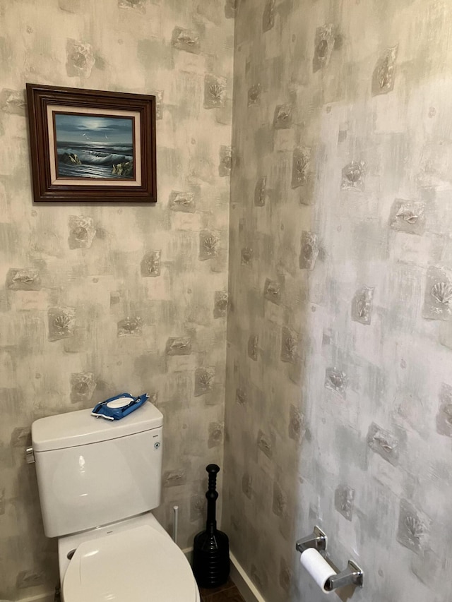 bathroom featuring toilet