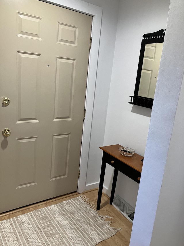 doorway to outside featuring light wood-type flooring