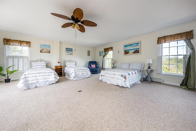 bedroom featuring carpet flooring, a ceiling fan, and baseboards