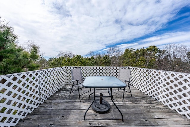 deck with outdoor dining space