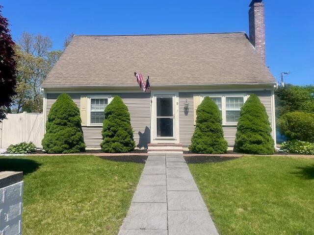 2 Spinning Brook Rd, South Yarmouth, MA 02664 - new england style home with a chimney and roof with shingles