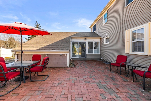 view of patio / terrace featuring fence