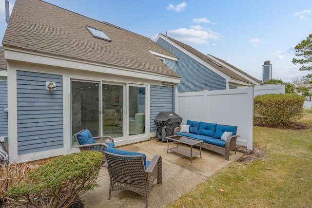 view of patio / terrace featuring an outdoor hangout area, fence, and grilling area